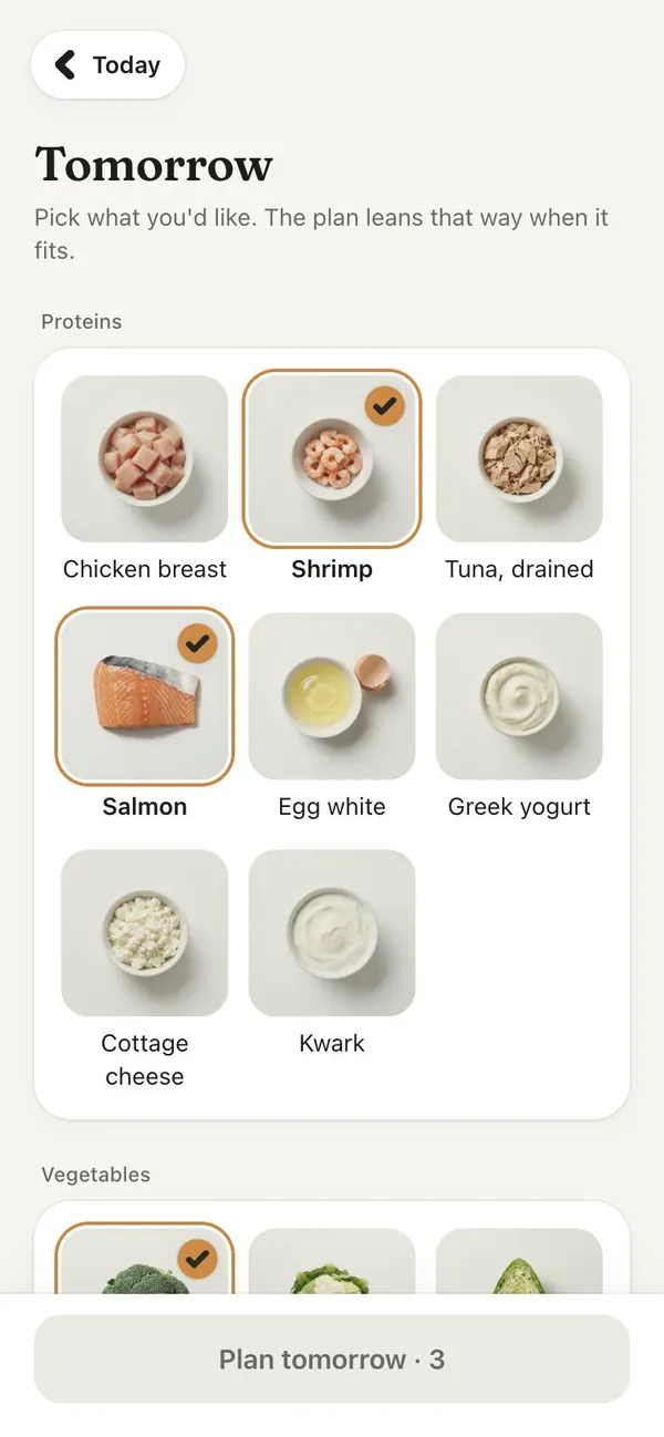 The Tomorrow screen: pick the foods you would like, such as shrimp and salmon, and the plan leans that way.